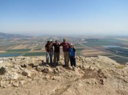 Concordia students Ian Smith, Tyler Zander, Dustin Atkinson, and Concordia alumn Ryan Duerr enjoy the view from Mt. Precipice in Lower Galilee, with the Jezreel Valley in the background.